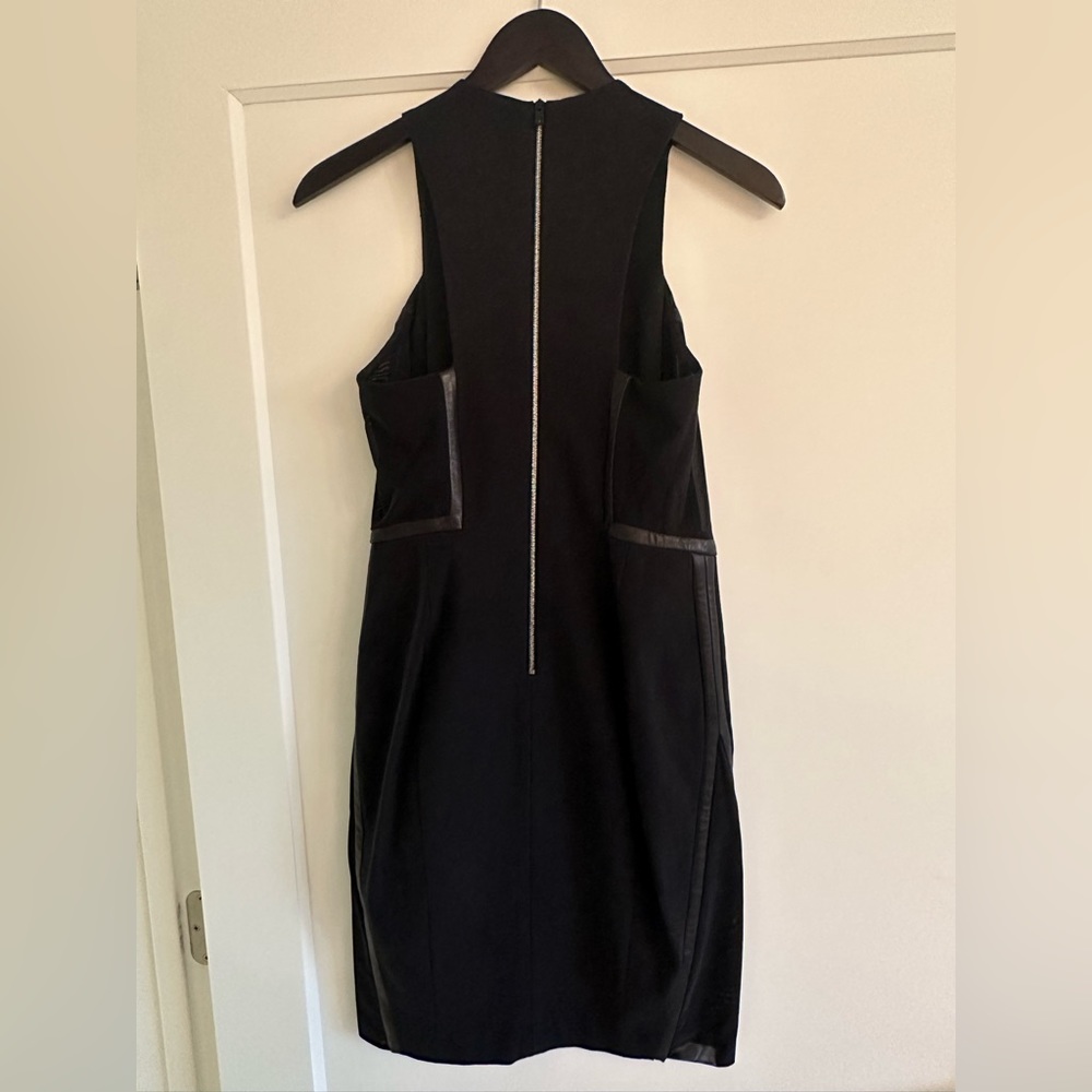 Beautiful Rag & Bone store exclusive black dress. Size 6 in like-new condition!